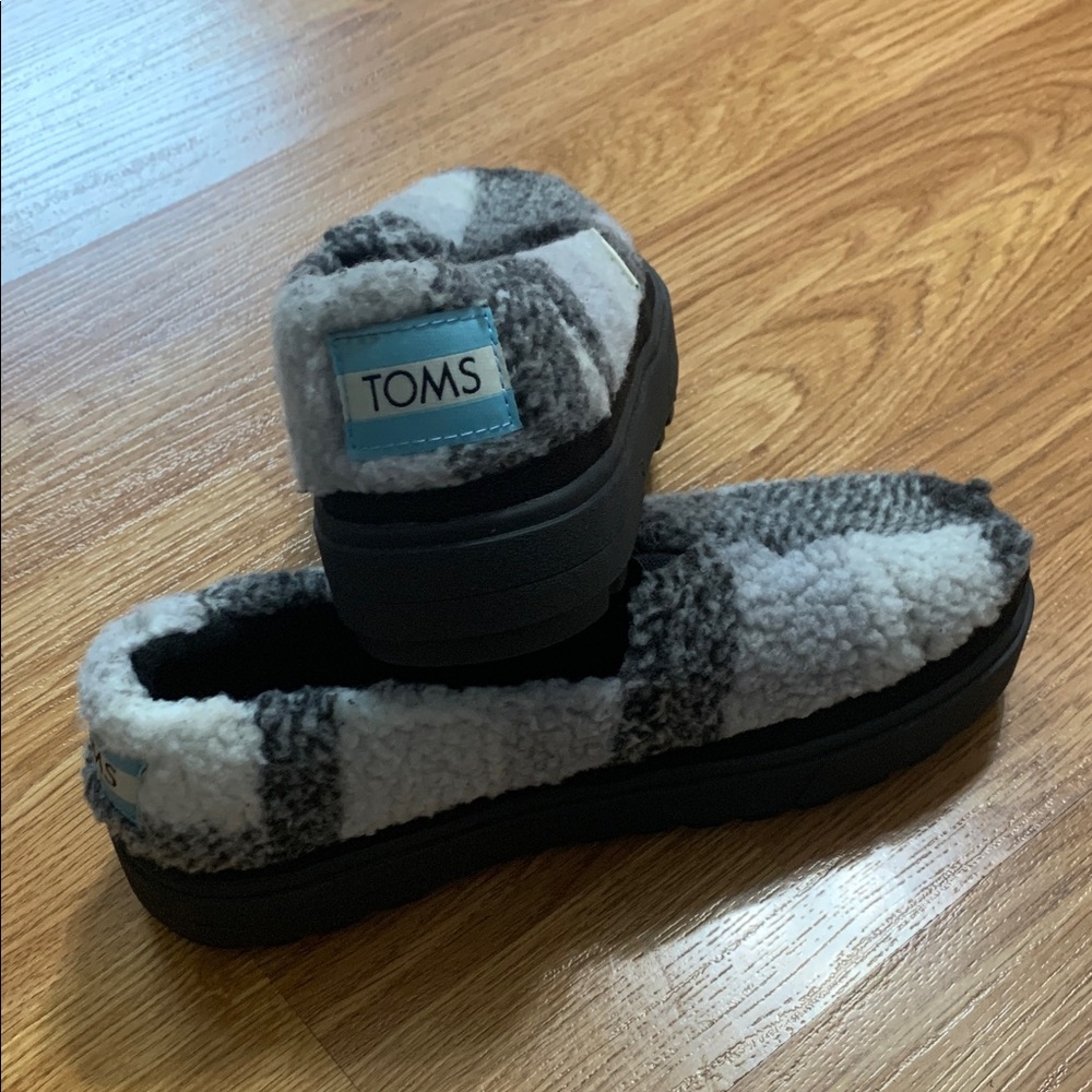 New - TOMS Black and Gray Fuzzy Slip-Ons